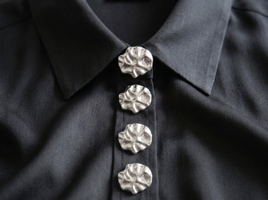 silver flat button